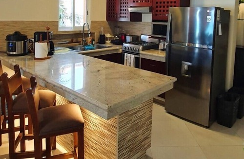 Cozumel Condo | Closest to Sandy Beach! Amazing views. Walk to Chankanaab, Uvas & Money Bar.