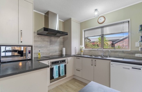 Raglan House | Coastal Calm - Raglan Holiday Home