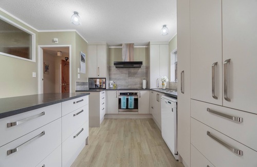 Raglan House | Coastal Calm - Raglan Holiday Home