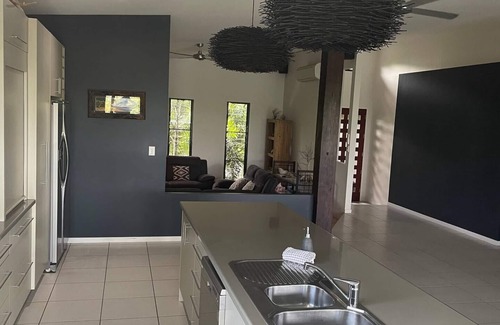 Hideaway Bay House | COCONUTS - Absolute Beachfront home in Hydeaway Bay