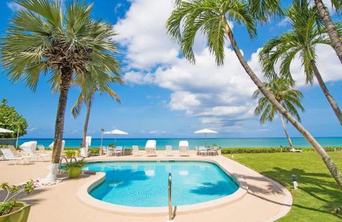 Seven Mile Beach House | Cocoplum #3 Condo