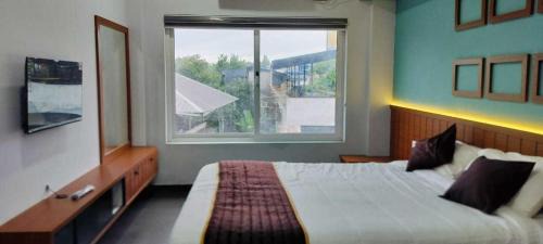 Nedumangad Hotel | Collection O KSRTC Bus Terminal Venjarammoodu Downtown