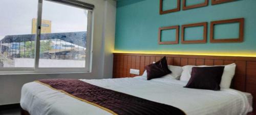 Nedumangad Hotel | Collection O KSRTC Bus Terminal Venjarammoodu Downtown