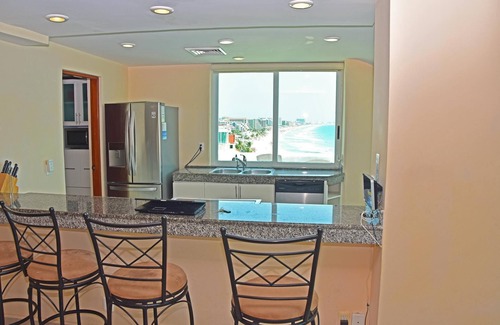 Zona Hotelera Hotel | Combo #3124 - Tim’s Ocean Condos – Beachfront 12br/10.5bth & Amazing Views!