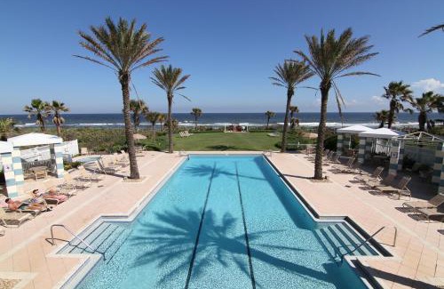 Palm Coast House | Come stroll along the beach and enjoy shared resort style amenities!