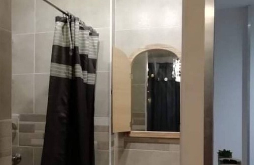 Saint-Vincent-de-Paul Bed & Breakfast | Comfortable room with swimming pool, bathroom and wc.