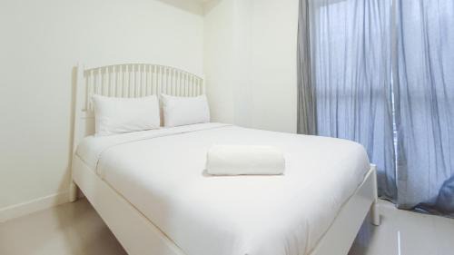 Makassar Apartment | Comfortable and Tidy 2BR at Vida View Apartment By Travelio
