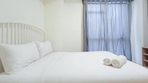 Makassar Apartment | Comfortable and Tidy 2BR at Vida View Apartment By Travelio