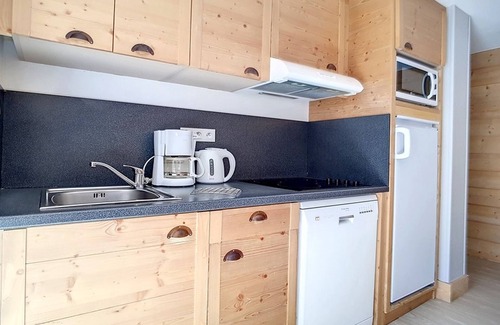 Les Bruyeres Apartment | Comfortable Apartment · Ski-In/Ski-Out · Covered Parking Included