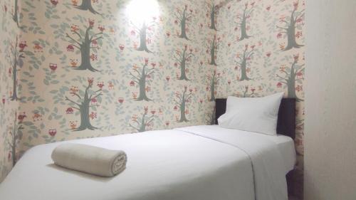 Surabaya Apartment | Comfortable Living 2BR at Dian Regency Apartment By Travelio