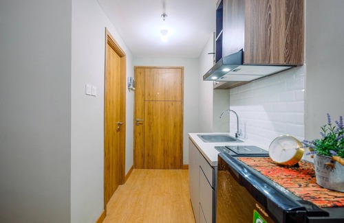 Duren Sawit Apartment | Comfortable Pool View Studio Room at LRT City Jatibening Apartment
