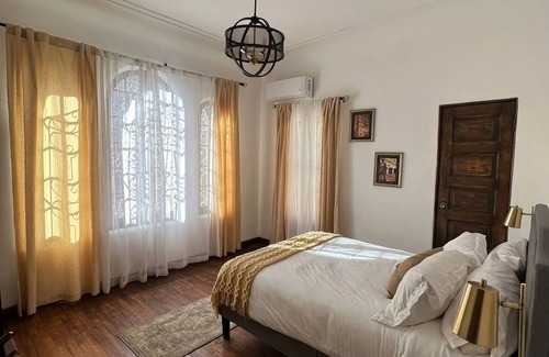 Juarez Municipality Hotel | Comfortable room in boutique Hotel Villa Reyna in historic house built in 1900!