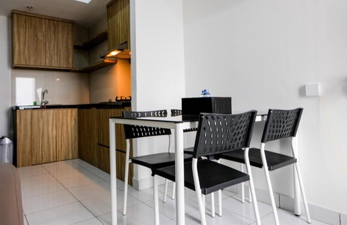 Pagedangan Apartment | Comfy 1BR Casa De Parco Apartment By Travelio