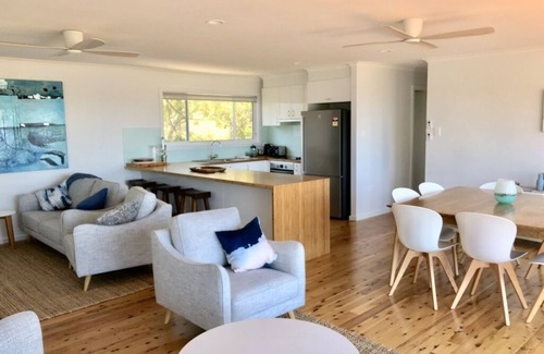 Macmasters Beach House | Comfy, completely refurbished family beach house with ocean views & walk to beac
