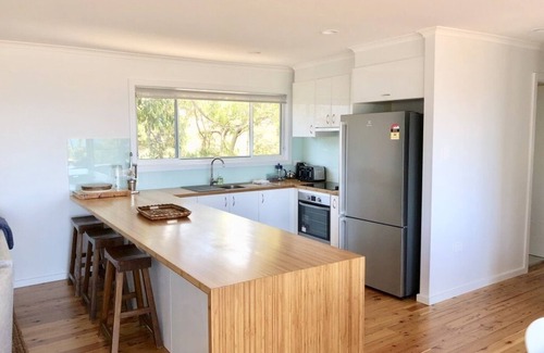 Macmasters Beach House | Comfy, completely refurbished family beach house with ocean views & walk to beac