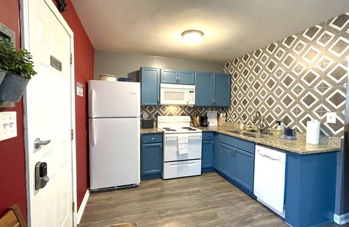 West End House | Comfy Luxe Villa Downtown with Custom Mural