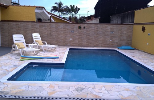 Caraguatatuba House | Cond.P. Patrimonium swimming pool, barbecue, 24h security WI-FI Air Conditioning