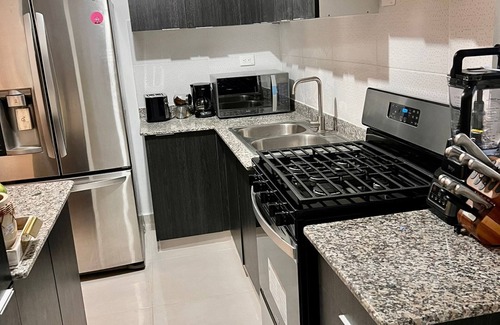 Villa Mella Apartment | Condo confortable avec piscine, votre oasis de confort à Santo Domingo Nord