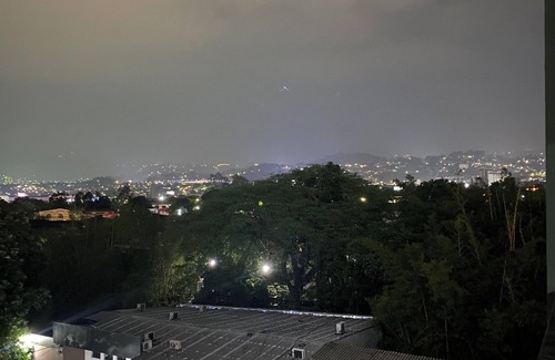 San Salvador Condo | Condo In El Salvador, with a King-size bed.