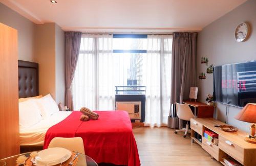 Bel-Air Apartment | Condo in Makati with Fast WiFi, Free Pool, Netflix and Own Balcony