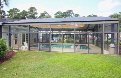 Myrtle Beach House | Condo with central AC, washer/dryer, shared outdoor pool, & on-site golf