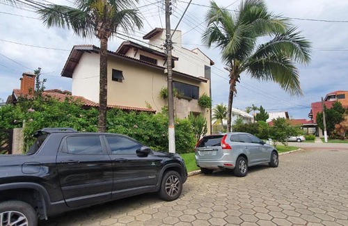 Condominio Residencial Bounganvillee House | condomínio frente a praia