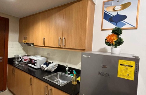 Barangay 76 Apartment | Condotel Apartment with terrace near seaside with full kithen, wifi and netflix