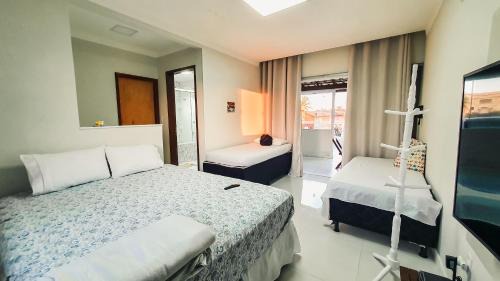 Arembepe Apartment | Confortável casa em Arembepe,100 metros da Praia com Churrasqueira Piscina e Wi-fi