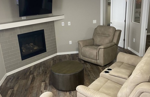 Wisconsin Rapids Apartment | Contemporary 1400 sq ft space in lower level Open concept gas burning fireplace
