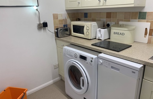Sidmouth Apartment | Contemporary apartment with parking, lift, balcony, close to sea front and town