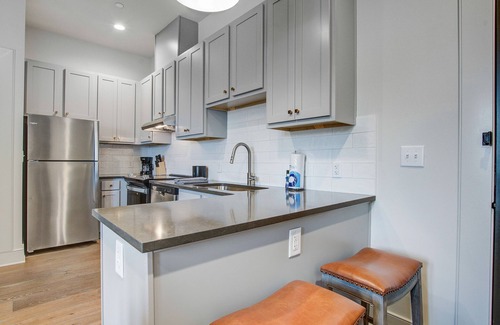 Westside Condo | Contemporary condo & connected suite with full kitchen, balcony, rooftop deck