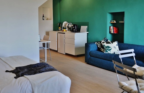 Citta della Pieve Apartment | Contemporary decor in a Medieval townhouse: studio suite with Umbrian hill views