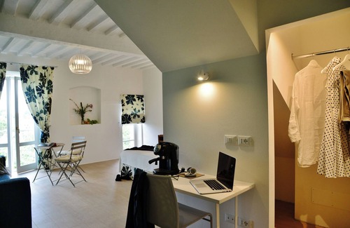 Citta della Pieve Apartment | Contemporary decor in a Medieval townhouse: studio suite with Umbrian hill views