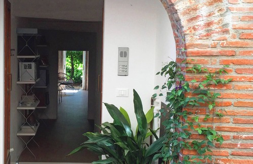 Citta della Pieve Apartment | Contemporary decor in a Medieval townhouse: studio suite with Umbrian hill views