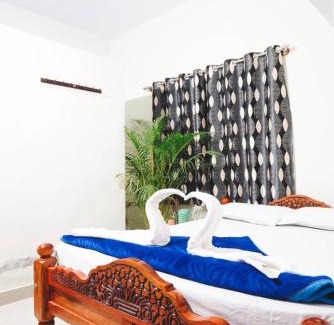 Kushalnagar House | Coorg peacock feathers home stay