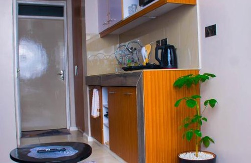 Nairobi Apartment | Coral bells by Tsavo