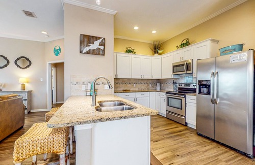 Rockport House | Coral Reef coastal home with pool, covered deck, central AC & W/D