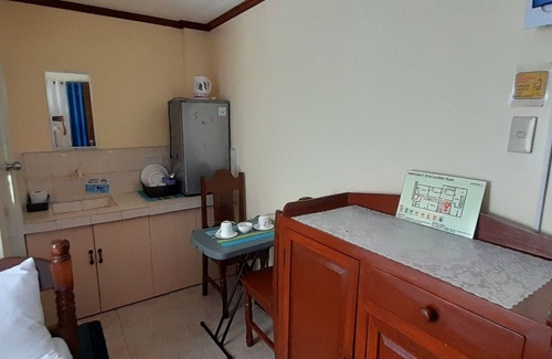 Balabag Apartment | Coralyn's Place small room with private toilet and kitchenette