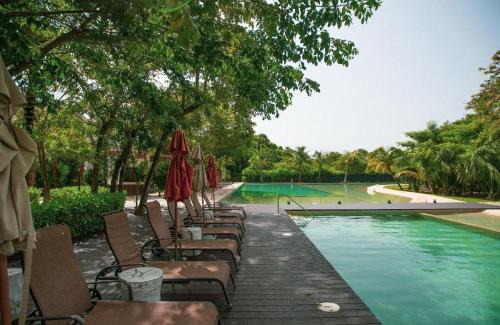Villa Juarez Apartment | Corasol Nick Price By PARR CONDOS