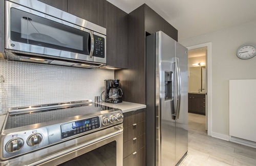 Downtown Apartment | Corporate Stays - Luxurious 1BR Apartment with Upscale Amenities and City Views
