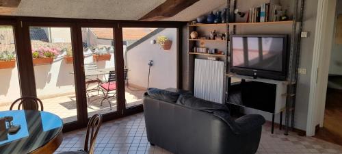 Ravenna Apartment | Corte Cavour. Una mansarda nel cuore della città