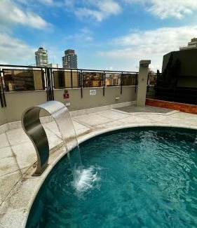 Gonzaga Hotel | Cosmopolitan PRAIA Flat com Estacionamento Grátis - Gonzaga - Ap 76