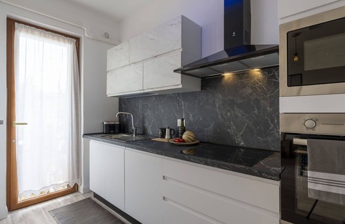 Santo Stefano al Mare Apartment | Cosy apartment for 4 guests with pool, WIFI, A/C, TV and balcony