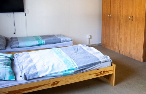 Hradec Kralove House | Cosy apartment in villa for 12 people with WIFI, TV, patio, pets allowed and parking