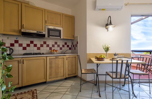 Canneddi Apartment | Cosy apartment for 4 people with WIFI, pool, A/C, TV, terrace and pets allowed