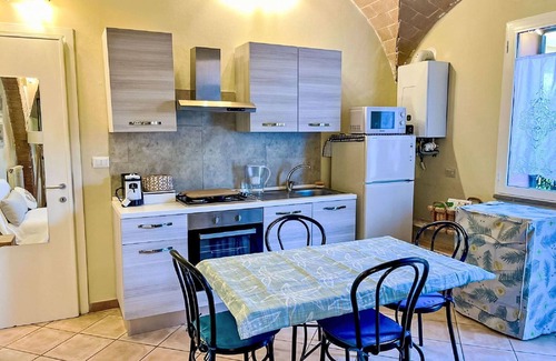 Cecina Apartment | Cosy apartment for 3 guests with A/C, pool, WIFI, TV and pets allowed
