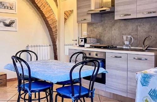 Cecina Apartment | Cosy apartment for 3 guests with A/C, pool, WIFI, TV and pets allowed