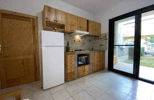 La Caletta Apartment | Cosy apartment for 4 guests with WIFI, TV, terrace and parking