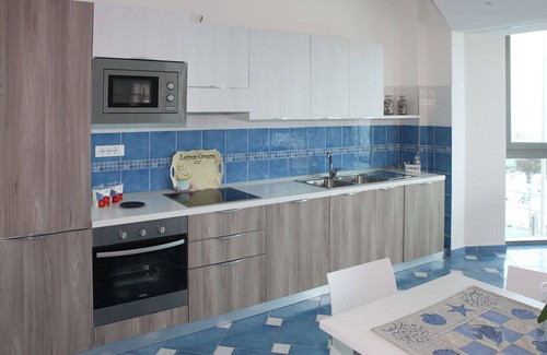 Latina Lido Apartment | Cosy apartment for 5 people with WIFI, A/C, pool, TV, balcony and pets allowed