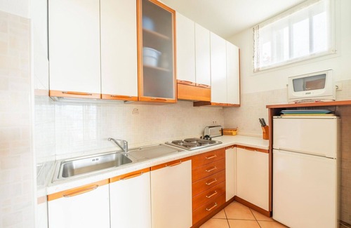 Germignaga Apartment | Cosy apartment for 4 people with pool, WIFI, TV and terrace